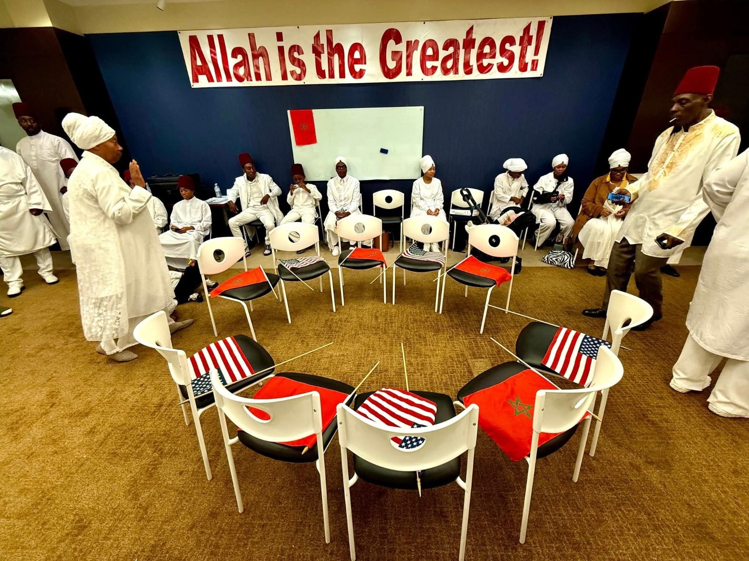 Members gathered in a circle on Holy Day